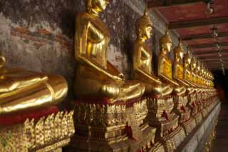 photo,material,free,landscape,picture,stock photo,Creative Commons,A golden Buddhist image line of Wat Suthat, temple, Buddhist image, corridor, Gold