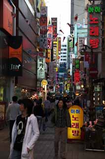 photo,material,free,landscape,picture,stock photo,Creative Commons,Row of houses along a city street of Myondong, Neon, crowd, restaurant, street