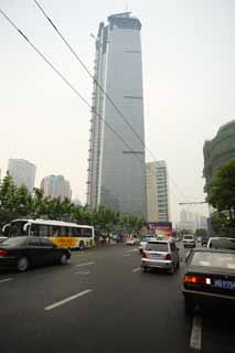 photo,material,free,landscape,picture,stock photo,Creative Commons,Row of houses along a city street of Shanghai, building, paved road, bus, car